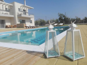 Отель Edem Suites  Марафополис